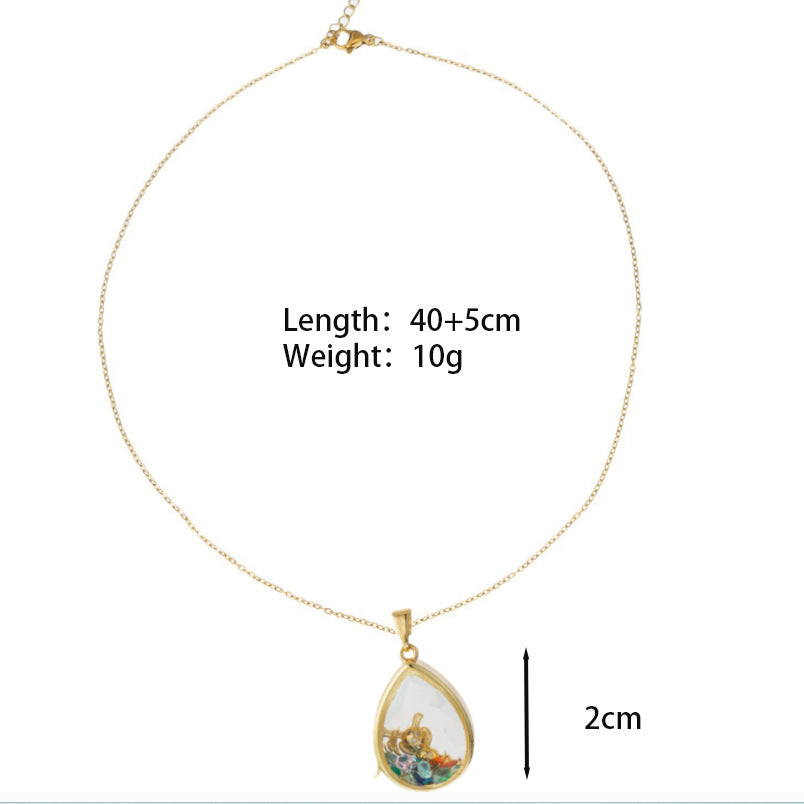 💚 Vintage Teardrop Locket – Pressed Flower & Gemstone Charm