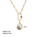 💚 Vintage Teardrop Locket – Pressed Flower & Gemstone Charm